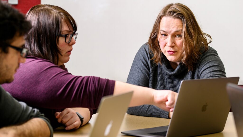 Irena Knezevic, electrical and computer engineering professor in the College of Engineering at the University of Wisconsin-Madison, talks with graduate students during a progress check-in meeting on Feb. 26, 2020. Knezevic is a recipient of a 2020 Distinguished Teaching Award. (Photo by Bryce Richter /UW-Madison)